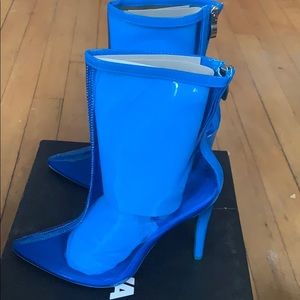 Clear blue heeled boots